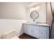Modern bathroom featuring a vanity with granite countertop, vessel sink, and shiplap wall at 3954 Edgemoor Way, Las Vegas, NV 89121