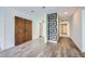 Clean hallway with wood-look floors and modern wall design at 3954 Edgemoor Way, Las Vegas, NV 89121