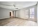 Spacious living room with large windows and gray walls at 3954 Edgemoor Way, Las Vegas, NV 89121