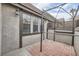 Small patio with brick flooring and metal pergola at 3954 Edgemoor Way, Las Vegas, NV 89121