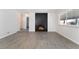 Living room with fireplace and grey tile floors at 421 Box Elder Way, Henderson, NV 89015