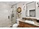 Modern bathroom with glass shower, stone flooring and vanity at 4386 Jerdon Ct, Las Vegas, NV 89129