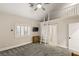 Upstairs bedroom with loft, built-in ladder, and ensuite bathroom at 4386 Jerdon Ct, Las Vegas, NV 89129