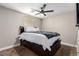 Bedroom with a double bed, ceiling fan, and mounted TV at 4924 Conglobate St, Las Vegas, NV 89122