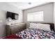 Bedroom with dresser and window at 4924 Conglobate St, Las Vegas, NV 89122