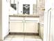 Bathroom with white vanity, tile flooring and bathtub at 5086 Jeffreys St # 201, Las Vegas, NV 89119