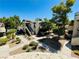 Spanish style building with landscaped courtyard and walkway at 5086 Jeffreys St # 201, Las Vegas, NV 89119