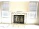 Living room fireplace with white mantel at 5086 Jeffreys St # 201, Las Vegas, NV 89119