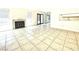 Bright living room with fireplace and tile floors at 5086 Jeffreys St # 201, Las Vegas, NV 89119