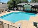 Clean and refreshing community pool with surrounding patio at 5086 Jeffreys St # 201, Las Vegas, NV 89119