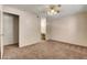 Bright bedroom featuring carpeted floors and ceiling fan at 5261 Mission Carmel Ln # 202, Las Vegas, NV 89107