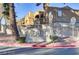 Entrance to the Meadows community with signage and landscaping at 5261 Mission Carmel Ln # 202, Las Vegas, NV 89107