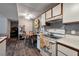Cozy kitchen with white cabinets and a gas stove at 5261 Mission Carmel Ln # 202, Las Vegas, NV 89107