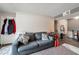 Living room with gray couch and access to entryway at 5261 Mission Carmel Ln # 202, Las Vegas, NV 89107