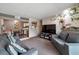 Spacious living room with comfy couches and a large TV at 5261 Mission Carmel Ln # 202, Las Vegas, NV 89107