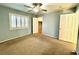 Bright bedroom with neutral walls and carpet flooring at 56 Toggle St, Henderson, NV 89012