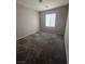 Simple bedroom with neutral wall and carpet at 5937 Armide St, North Las Vegas, NV 89081