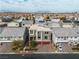 Aerial view of a modern home in a suburban neighborhood with mountain views at 6276 Olde Lockford Ct, Las Vegas, NV 89139