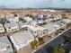 Aerial view of new construction homes in a suburban neighborhood with mountain views at 6276 Olde Lockford Ct, Las Vegas, NV 89139