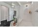 Sleek bathroom showcasing a glass-enclosed shower with a built-in bench and modern fixtures at 6276 Olde Lockford Ct, Las Vegas, NV 89139