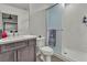 Clean bathroom with shower and vanity and mirrored medicine cabinet at 6276 Olde Lockford Ct, Las Vegas, NV 89139