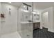 Modern bathroom features a glass shower, and a double sink vanity with lots of storage at 6276 Olde Lockford Ct, Las Vegas, NV 89139