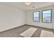 Sunny bedroom with dual windows and plush carpeting at 6276 Olde Lockford Ct, Las Vegas, NV 89139
