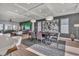 Spacious dining area with modern light fixtures, stylish decor, and an open layout perfect for entertaining at 6276 Olde Lockford Ct, Las Vegas, NV 89139