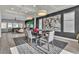 Elegant dining area with stylish lighting, modern table setting, and seamless flow to living space at 6276 Olde Lockford Ct, Las Vegas, NV 89139