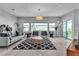 Inviting living room featuring neutral tones, ample natural light, and stylish furnishings at 6276 Olde Lockford Ct, Las Vegas, NV 89139