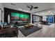 Modern living room with sleek furniture, black accent wall, and bright, open layout at 6276 Olde Lockford Ct, Las Vegas, NV 89139