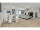 Spacious living room with recessed ceilings and a large sliding door with access to the backyard at 6276 Olde Lockford Ct, Las Vegas, NV 89139