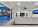Cozy living room with large sliding glass doors that open to outdoor patio at 6276 Olde Lockford Ct, Las Vegas, NV 89139
