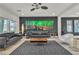 Stylish living room with modern decor, sleek furnishings, and plenty of natural light at 6276 Olde Lockford Ct, Las Vegas, NV 89139