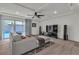 Cozy living room with recessed ceilings and sliding glass doors leading to a pool at 6276 Olde Lockford Ct, Las Vegas, NV 89139
