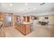 Open concept kitchen with large island and breakfast area at 7167 La Puebla St, Las Vegas, NV 89120