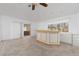 Bar area with light wood cabinetry and tile floor at 7520 W Wigwam Ave, Las Vegas, NV 89113