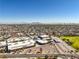 Aerial view of school campus with athletic facilities and surrounding neighborhood at 7873 Cherry River Dr, Las Vegas, NV 89145