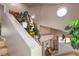 Plant-filled staircase with skylight at 7873 Cherry River Dr, Las Vegas, NV 89145