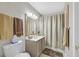 Clean bathroom with shower/tub combo, vanity, and linen storage at 7950 W Flamingo Rd # 1054, Las Vegas, NV 89147