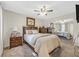 Bright bedroom with double bed, mirrored closet, and wood nightstands at 7950 W Flamingo Rd # 1054, Las Vegas, NV 89147