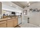 Kitchen features granite countertops and opens to living area at 7950 W Flamingo Rd # 1054, Las Vegas, NV 89147