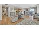 Open living space with hardwood floors, kitchen, and dining area at 7950 W Flamingo Rd # 1054, Las Vegas, NV 89147