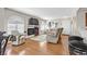 Living room with hardwood floors, fireplace, and neutral furniture at 7950 W Flamingo Rd # 1054, Las Vegas, NV 89147