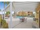Community pool and spa with covered seating area at 7950 W Flamingo Rd # 1054, Las Vegas, NV 89147