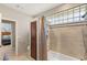 Bathroom with shower/tub combo and a linen closet at 9113 Golden Eagle Dr, Las Vegas, NV 89134
