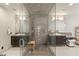 Spa-like bathroom with double vanities, large shower, and free-standing tub at 9113 Golden Eagle Dr, Las Vegas, NV 89134
