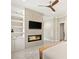 Main bedroom features a fireplace and built-in shelving at 9113 Golden Eagle Dr, Las Vegas, NV 89134