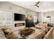 Gathering room features a modern fireplace and large TV at 9113 Golden Eagle Dr, Las Vegas, NV 89134