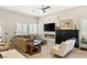 Spacious Gathering room with a cozy fireplace and large windows at 9113 Golden Eagle Dr, Las Vegas, NV 89134